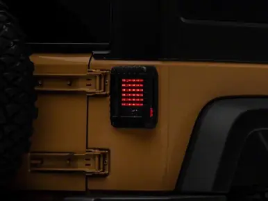 Holiday Sale Raxiom 07-18 Jeep Wrangler JK LED Tail Lights- Black Housing (Smoked Lens) - J115435