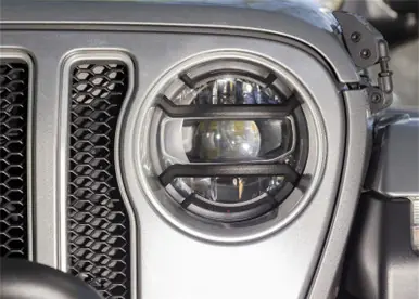 Discount Rugged Ridge 18-20 Jeep Wrangler JL / 2020 Jeep Gladiator JT Black Elite Headlight Guards Black - 11230.21